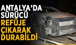 Antalya’da sürücü refüje çıkarak durabildi
