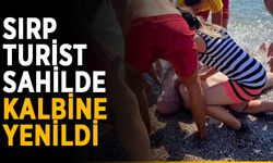 Sırp turist sahilde kalbine yenildi