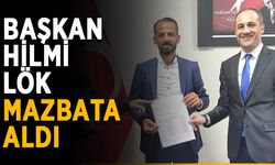 DP İlçe Başkanı Hilmi Lök, mazbatayı aldı