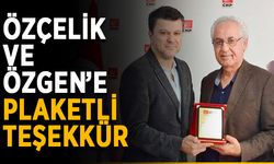 Özçelik ve Özgen’e plaketli teşekkür