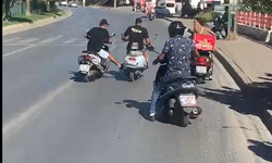 Alanya’da bozulan motosikleti ayağıyla iterek götürdü