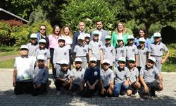 Alanya'da minik eller toprakla buluştu
