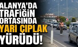 Sıcak başa vurdu! Alanya’da trafikte yarı çıplak yürüdü