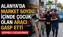 Alanya’da market soydu, içinde çocuk olan aracı gasp etti