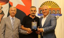 Başkan Erdem ve Kural’dan anlamlı plaket