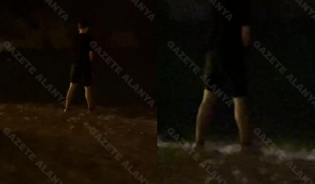 Alanya'nın en rahat insanı olabilir! Herkesin içinde sahile işedi