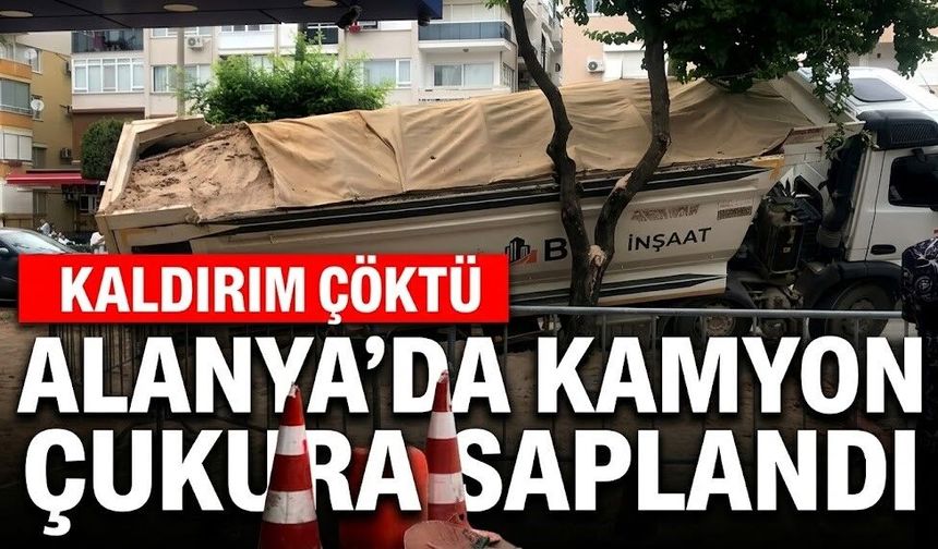 SON DAKİKA! Alanya’da kamyon çukura saplandı
