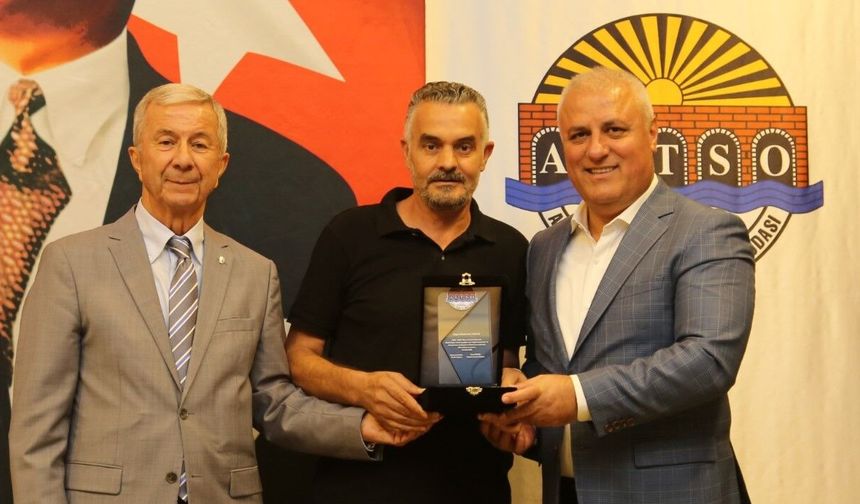 Başkan Erdem ve Kural’dan anlamlı plaket